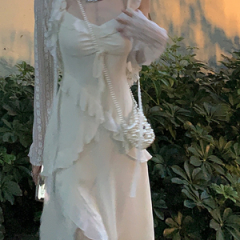 法式吊带连衣裙女温柔夏季高级感显瘦荷叶边小众开叉白色仙女长裙